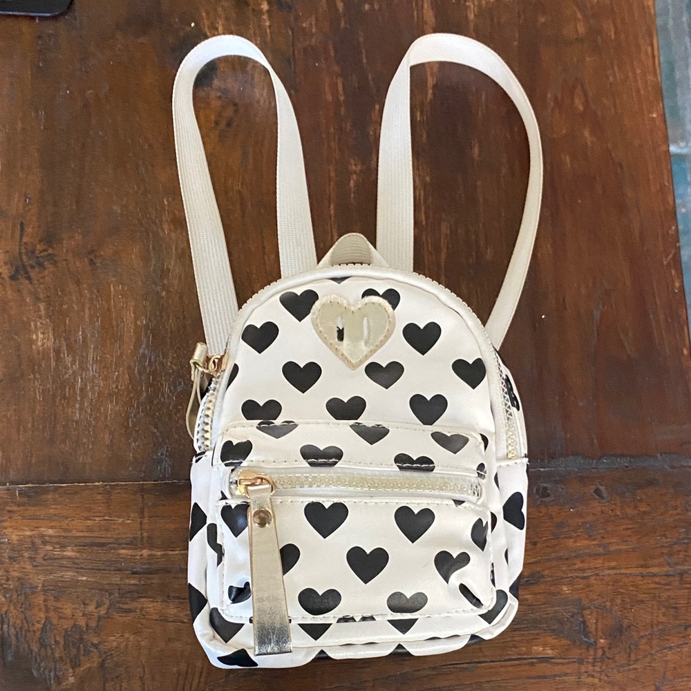 Claire's Cream and Black Heart Mini Backpack